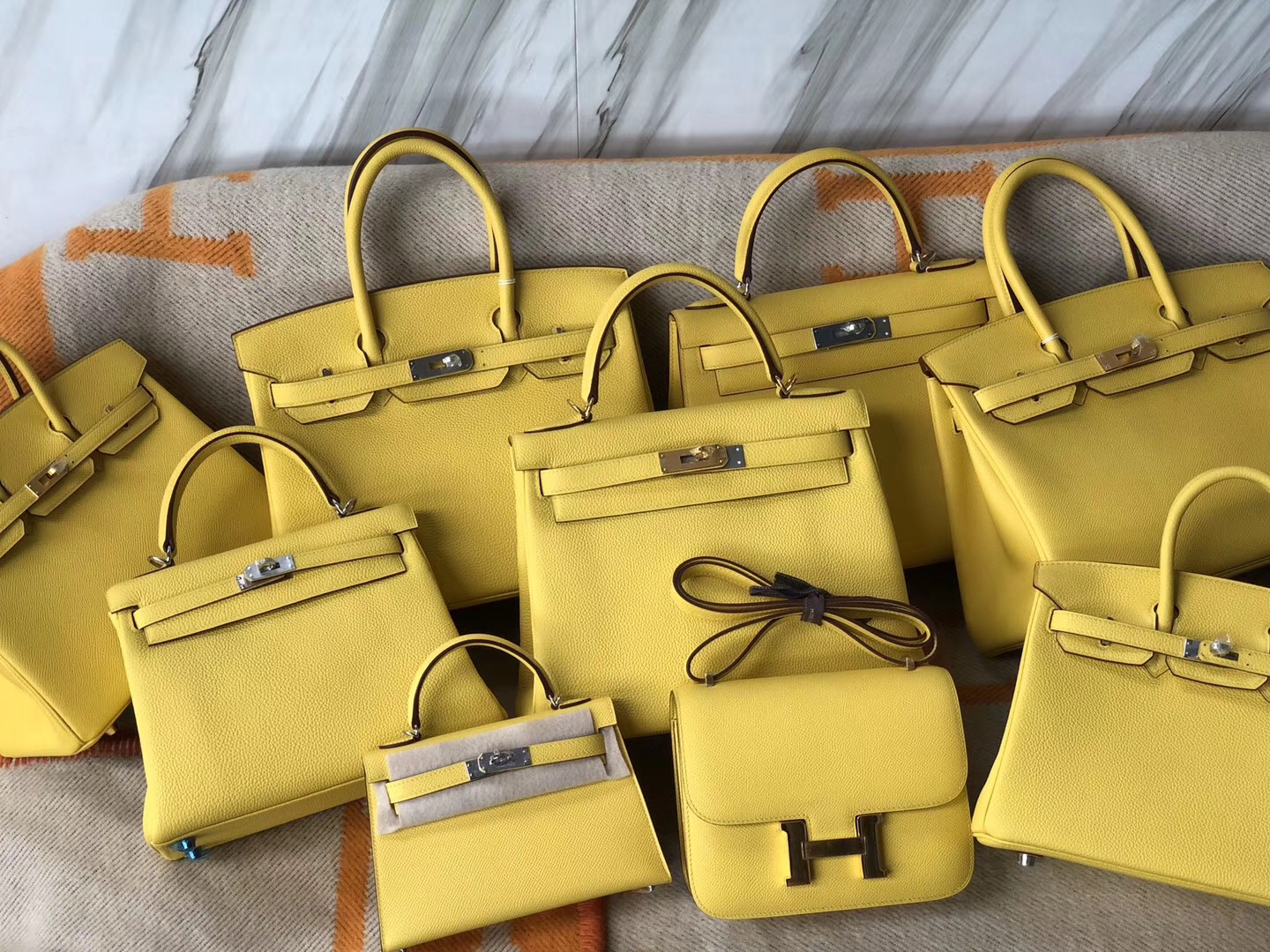 USA Hermes Kelly25cm 28cm 大小對比圖 9O那不勒斯黃 jaune de naples