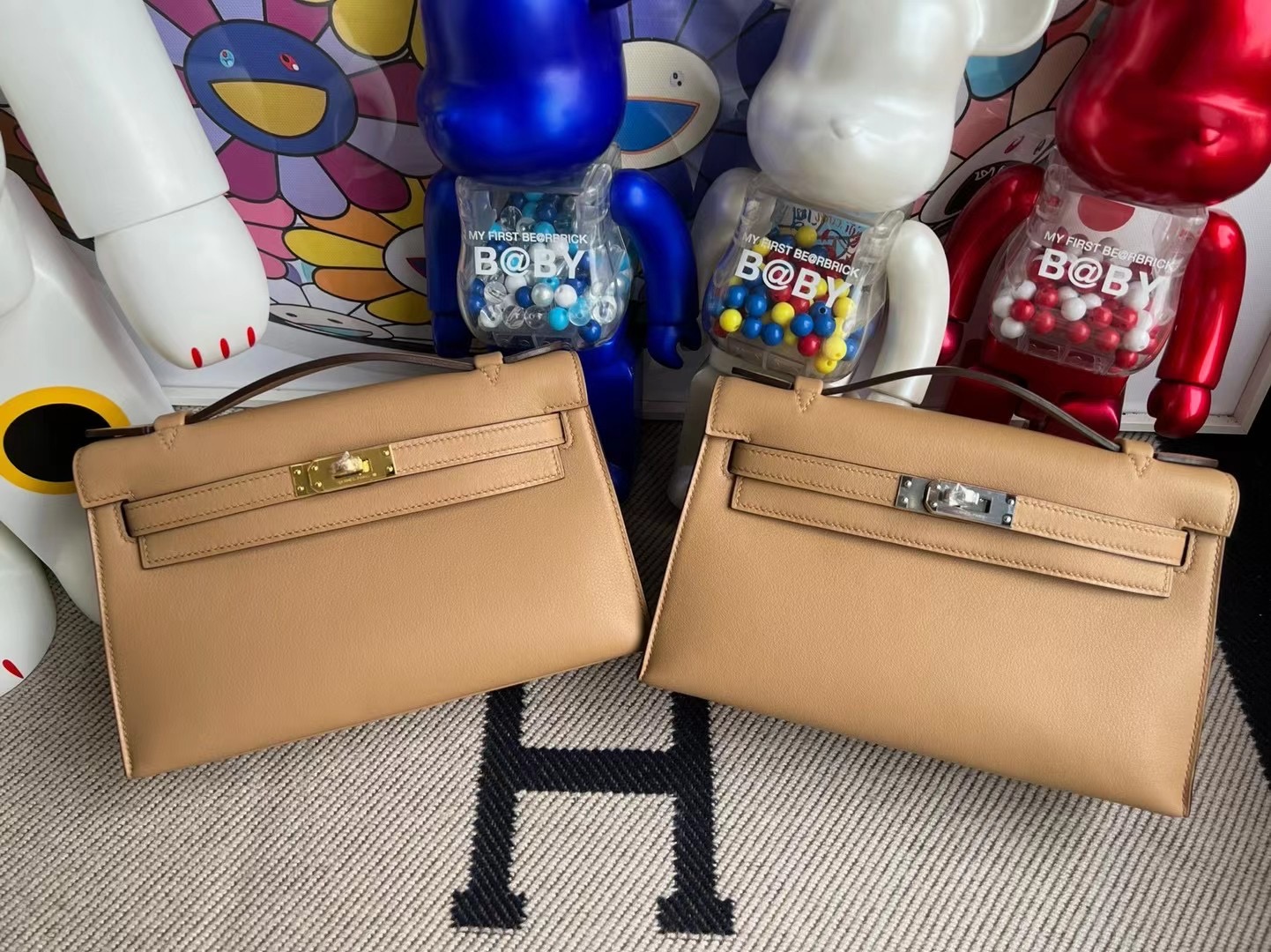 愛馬仕官網包包價格 Hermes Mini kelly Pochette Swift 0M Chai 瑪薩拉茶色 銀扣